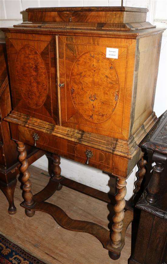 William and Mary banded burr walnut cabinet on stand